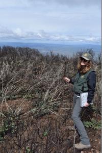 Photo of a woman on a chaparral hillside